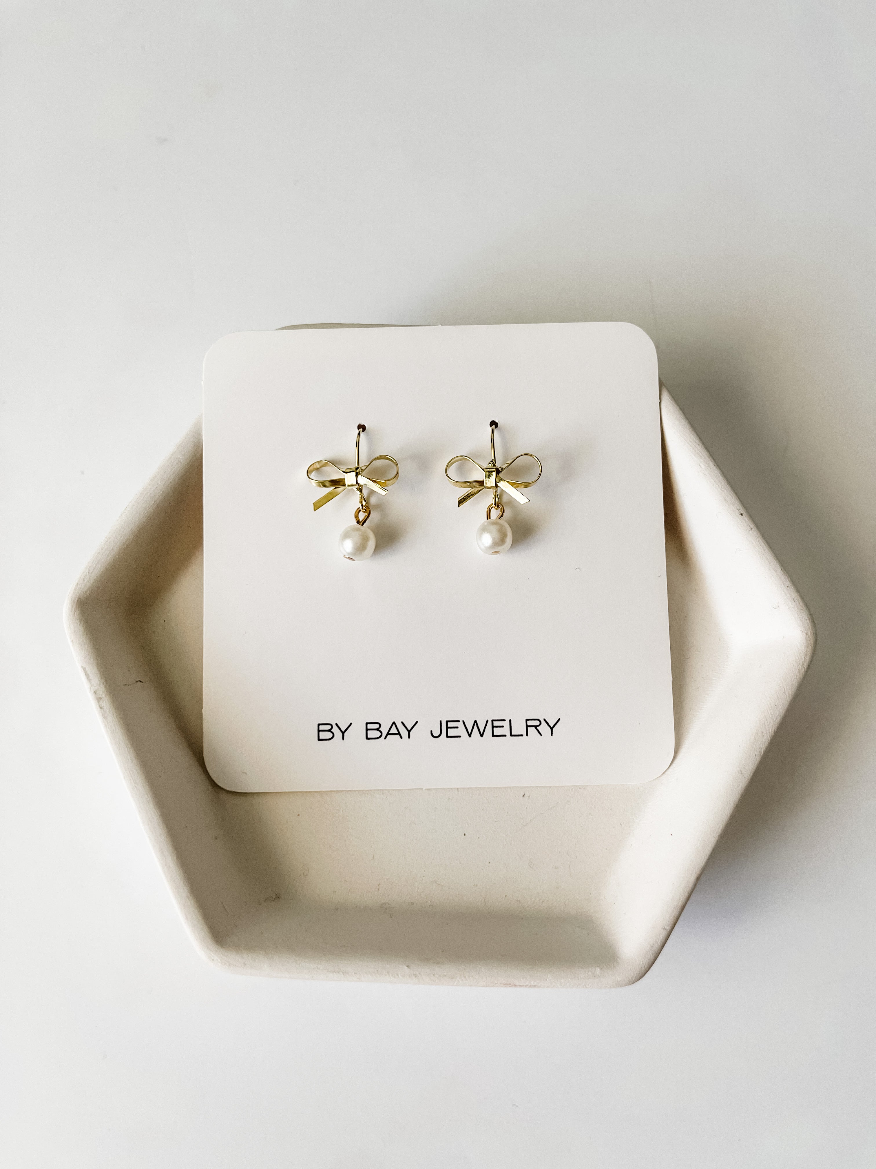 drop pearl bow earrings